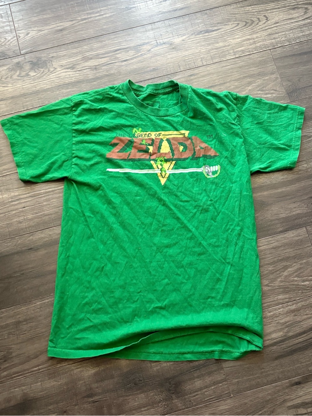 Reign Green Graphic Tee with Dark Printed Logo
